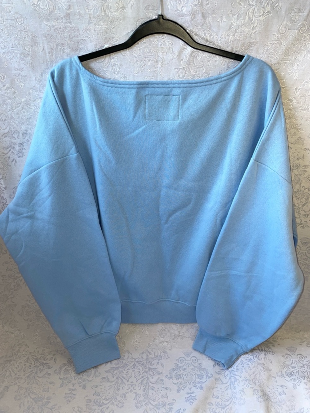 NWT Peanuts Light Blue Off-Shoulder Sweatshirt with Pink Bow Snoopy.  See XXL. - Picture 2 of 5